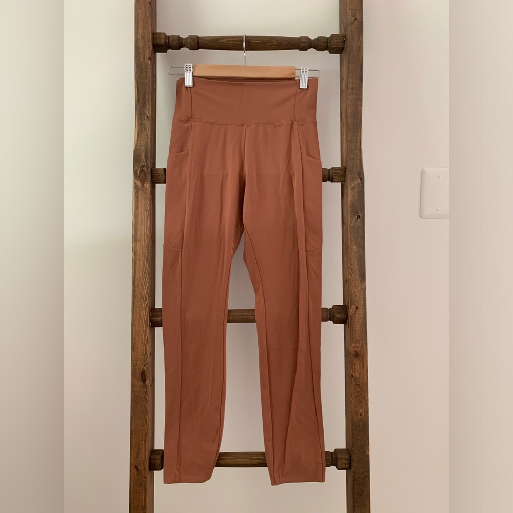 REI athletic leggings size M NWOT